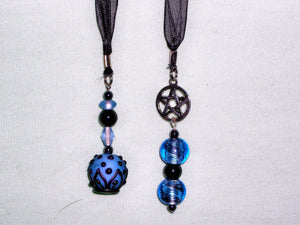 Black bookmark with dark blue beads.
