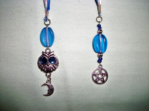 Blue and silver bookmark with multiple charms