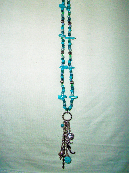 Blue necklace with silver and blue mixed pendant.