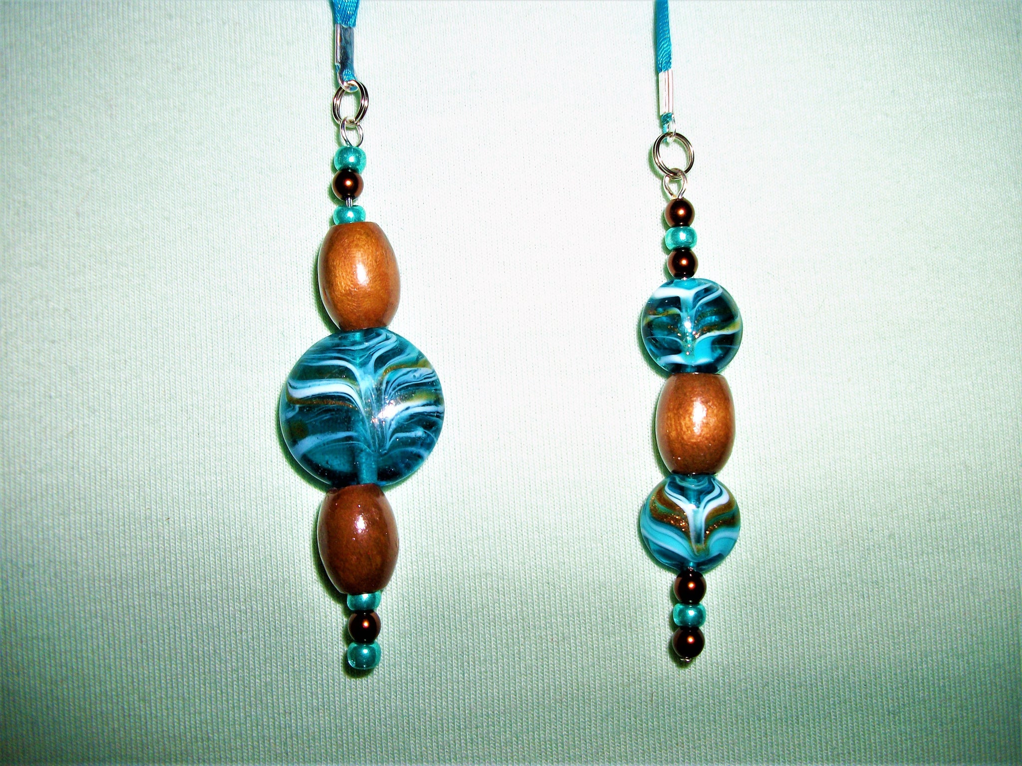 Blue bookmark with blue and brown beads