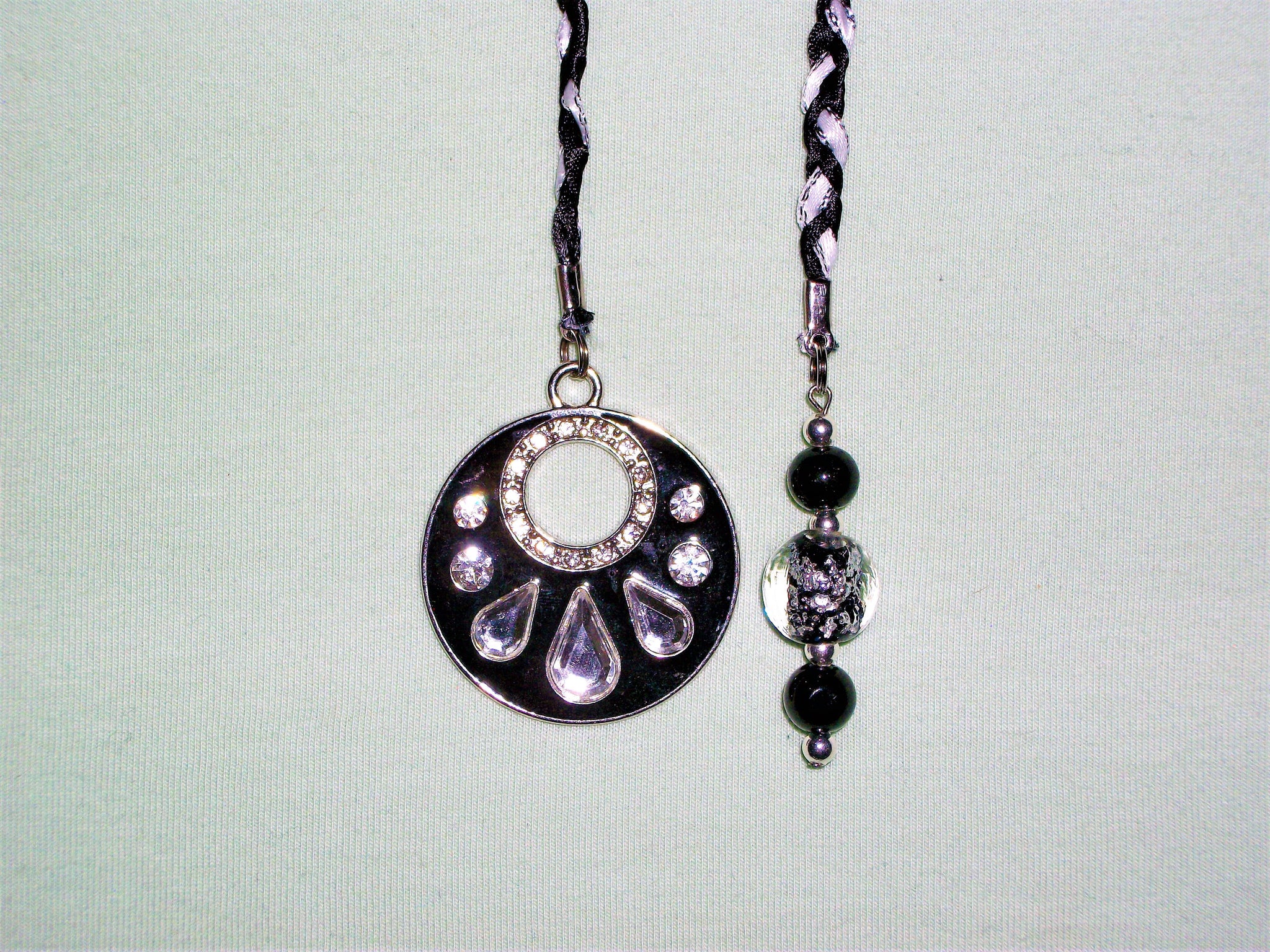 Black and white bookmark with black and silver beads and black pendant