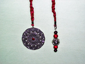 Red bookmark with red and silver beads and silver pendant