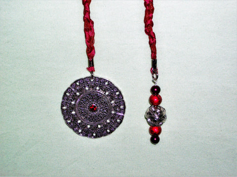 Red bookmark with red and silver beads and silver pendant