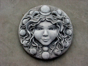 large concrete moon Goddess wall sculpture